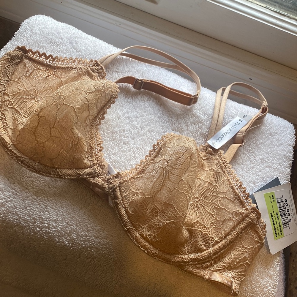 NWT. Calvin Kline bra in nude color size 32B.